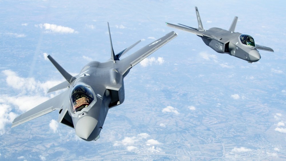 Two F-35 Lightning II’s bank after receiving fuel over the Midwest Sept. 19, 2019. The two aircraft were in route to the 158th Fighter Wing out of the Vermont Air National Guard Base, South Burlington, Vt., the first Air National Guard unit to receive the aircraft. U.S. Air Force photo/Master Sgt. Ben Mota.