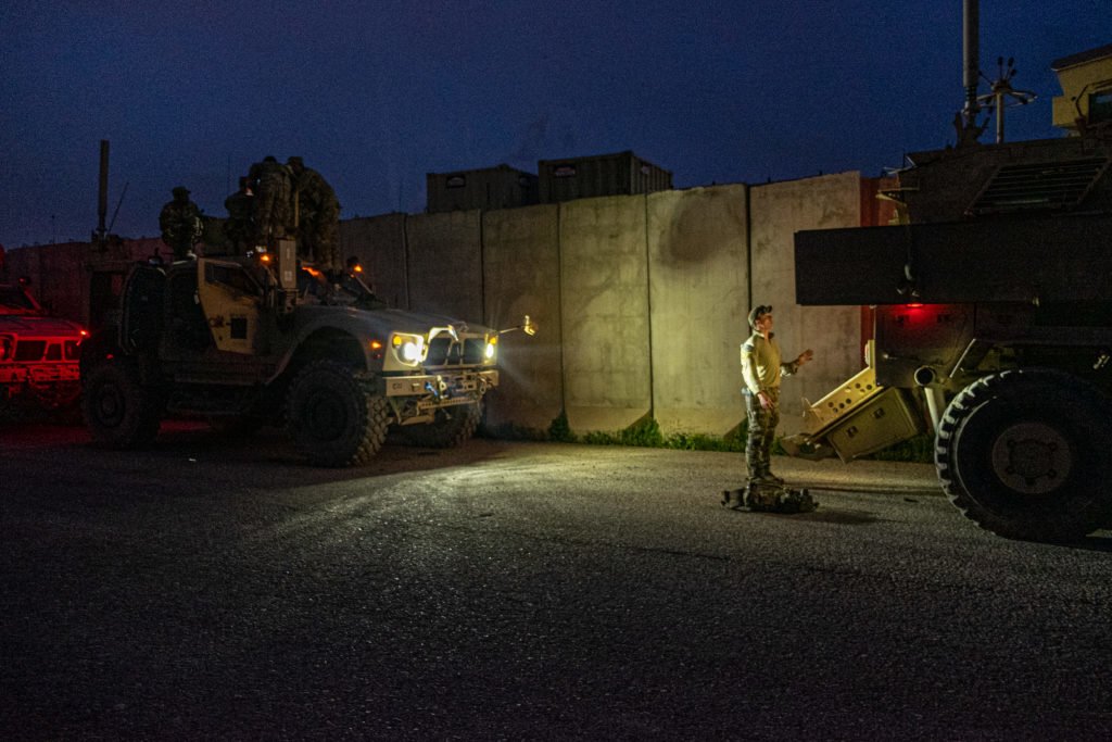 Members of 1-24 make their final trip from Mosul unloading the last of their equipment as they regroup in Erbil. Photo by Kevin Knodell/Coffee or Die.