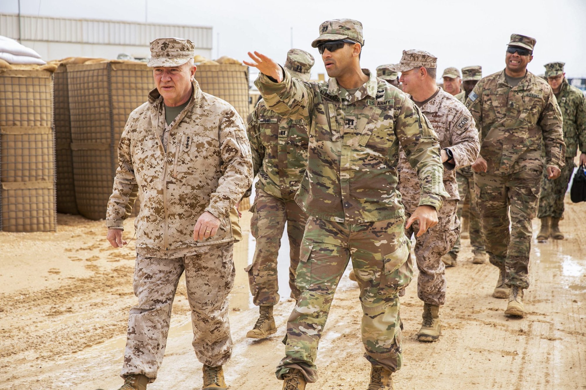 U.S. Marine Corps Gen. Kenneth F. McKenzie Jr., the commander of U.S. Central Command (USCENTCOM), left, walks with Soldiers assigned to 3rd Battalion, 4th Air Defense Artillery Regiment, Jan. 24, 2020. McKenzie visited the USCENTCOM Area of Responsibility to discuss security and stability in the region with forward deployed service members. (U.S. Marine Corps photo by Sgt. Roderick Jacquote)