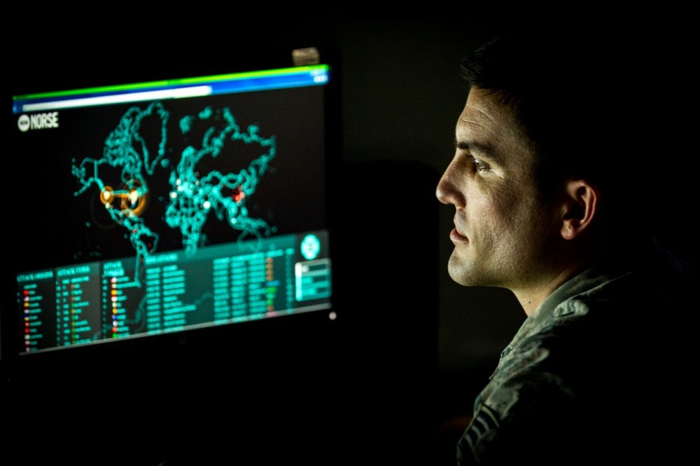 Staff Sgt. Wendell Myler, a cyber warfare operations journeyman assigned to the 175th Cyberspace Operations Group of the Maryland Air National Guard monitors live cyber attacks on the operations floor of the 27th Cyberspace Squadron, known as the Hunter’s Den, at Warfield Air National Guard Base, Middle River, Md., June 3, 2017. U.S. Air Force photo by J.M. Eddins Jr. via DVIDS.
