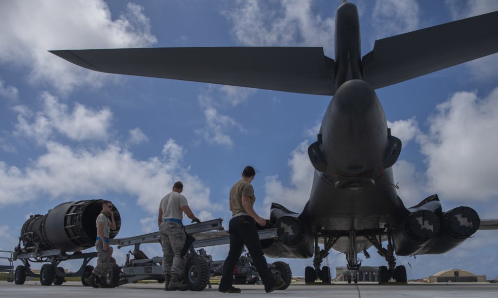 7th Aircraft Maintenance Squadron B-1B Lancer aircraft mechanics prepare to load an engine at Andersen Air Force Base, Guam, May 3, 2020. The B-1 carries four engines that help it reach speeds of more than 900 mph. Photo by Senior Airman River Bruce/U.S. Air Force.