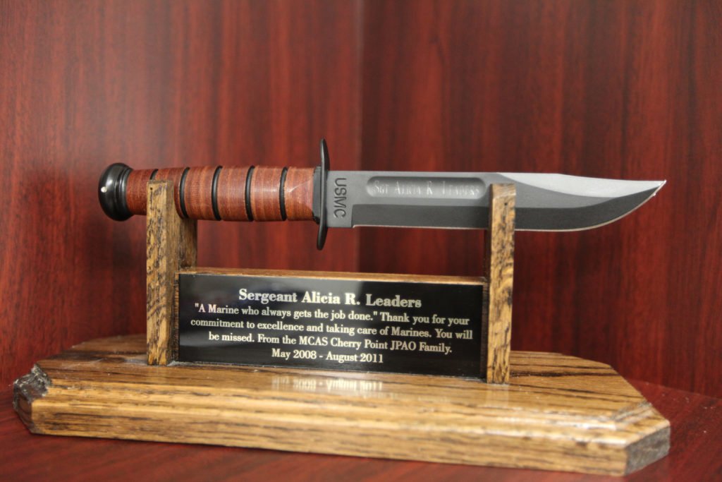 KA-BAR fighting knives are part of the history and legacy of the United States Marine Corps. KA-BARs are routinely awarded for retirements and going away gifts from fellow Marines. These knives are proudly displayed at Marines' work spaces. Photo by Corporal Martin Egnash/Marine Corps Installations East, courtesy of the Defense Visual Information Distribution Service.