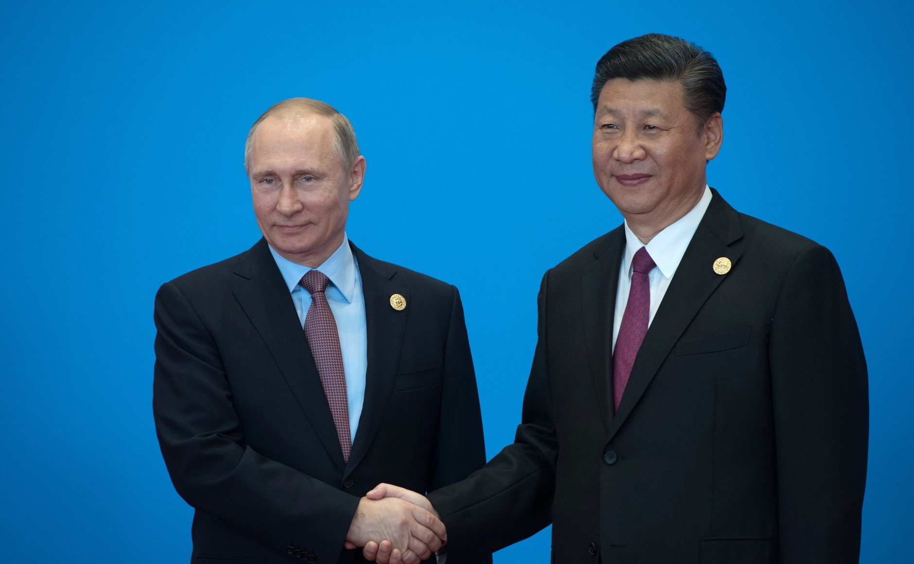 President of Russia Vladimir Putin with President of China Xi Jinping before a roundtable meeting of leaders during the Belt and Road international forum. Photo by the Russian Presidential Press and Information Office.