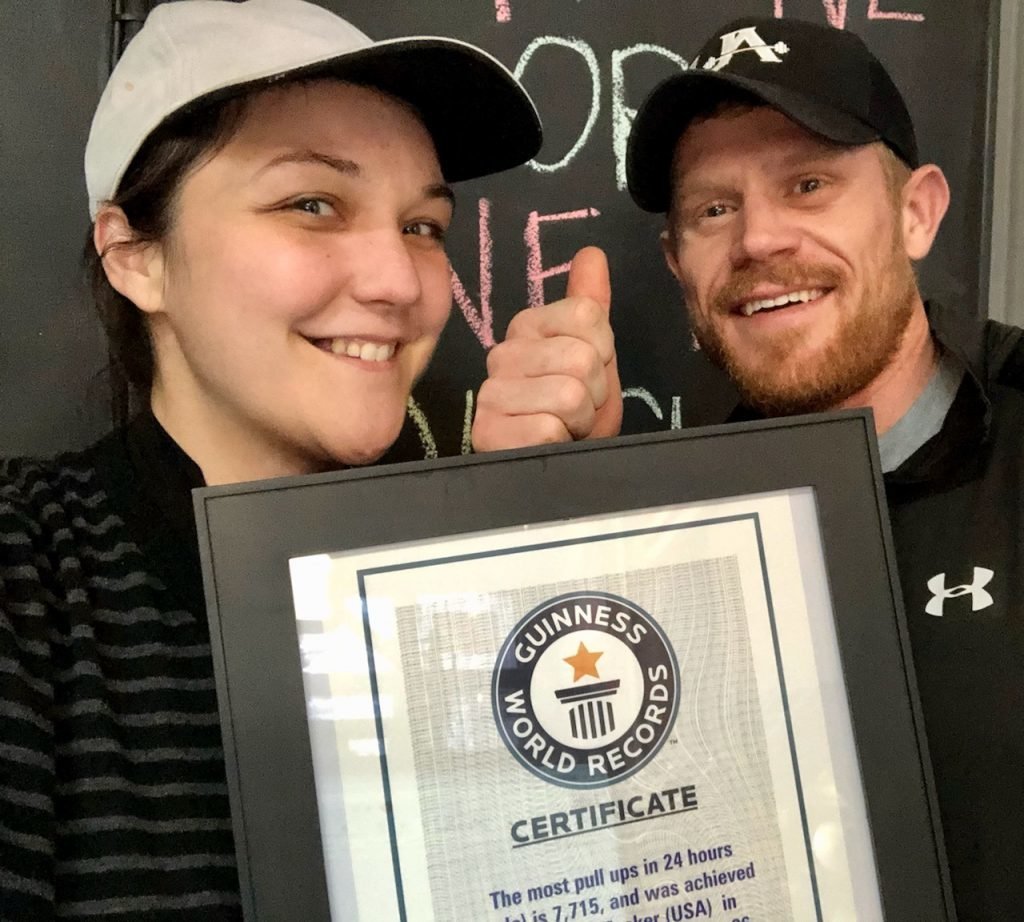 Brandon Tucker and Mary Kubik hold the official Guinness World Record certification. | Photo by Mary Kubik