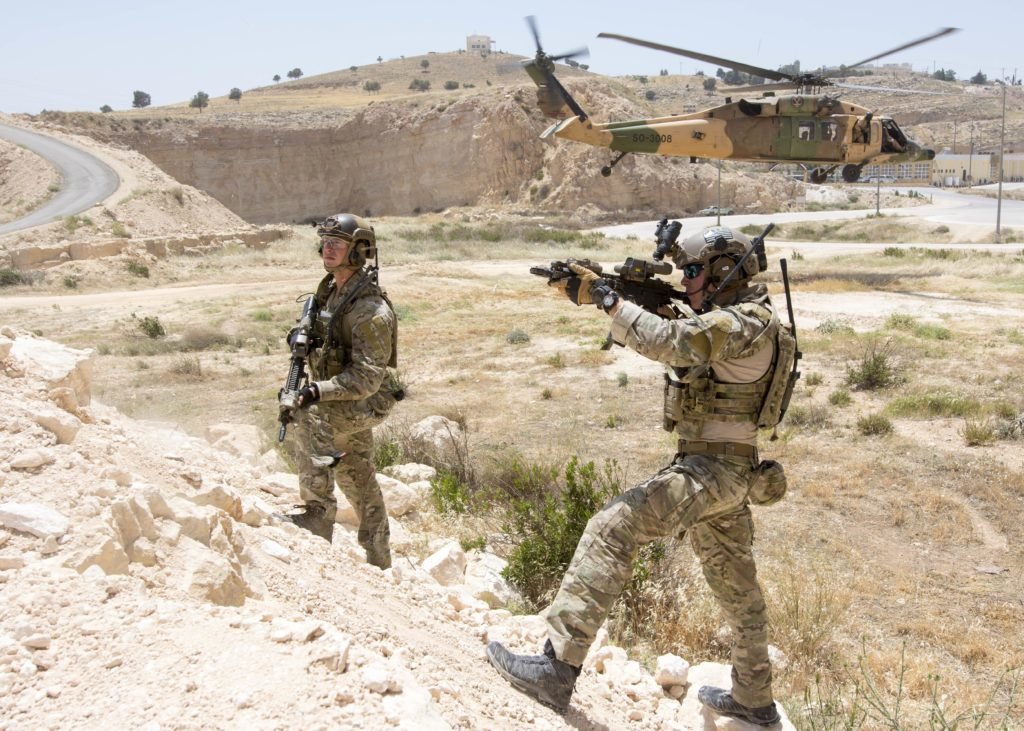 Members of the U.S. Air Force Special Operations Command, assigned to the 23rd Special Tactics Squadron, provide security of a landing zone during a combat search and rescue exercise in support of Eager Lion 2017. Photo by Christopher Lange/United States Air Force.