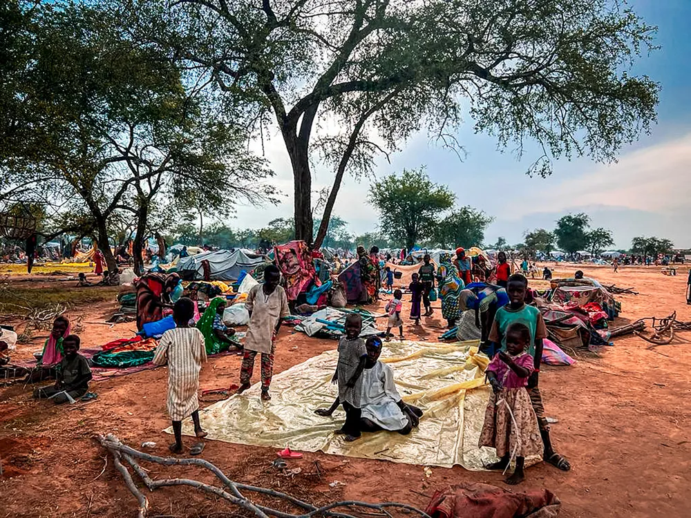 Sudanese refugees who fled the conflict in Sudan gather Monday July 10, 2023 at the Zabout refugee camp.