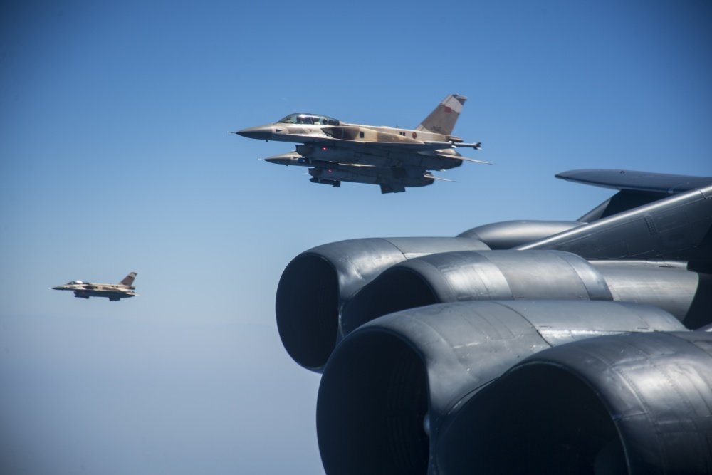 Moroccan F-16’s integrate with a U.S. B-52H Stratofortress assigned to the 5th Bomb Wing at Minot Air Force Base, North Dakota, during a Bomber Task Force mission, Sept. 7, 2020. U.S. Air Force photo by Senior Airman Xavier Navarro via DVIDS.