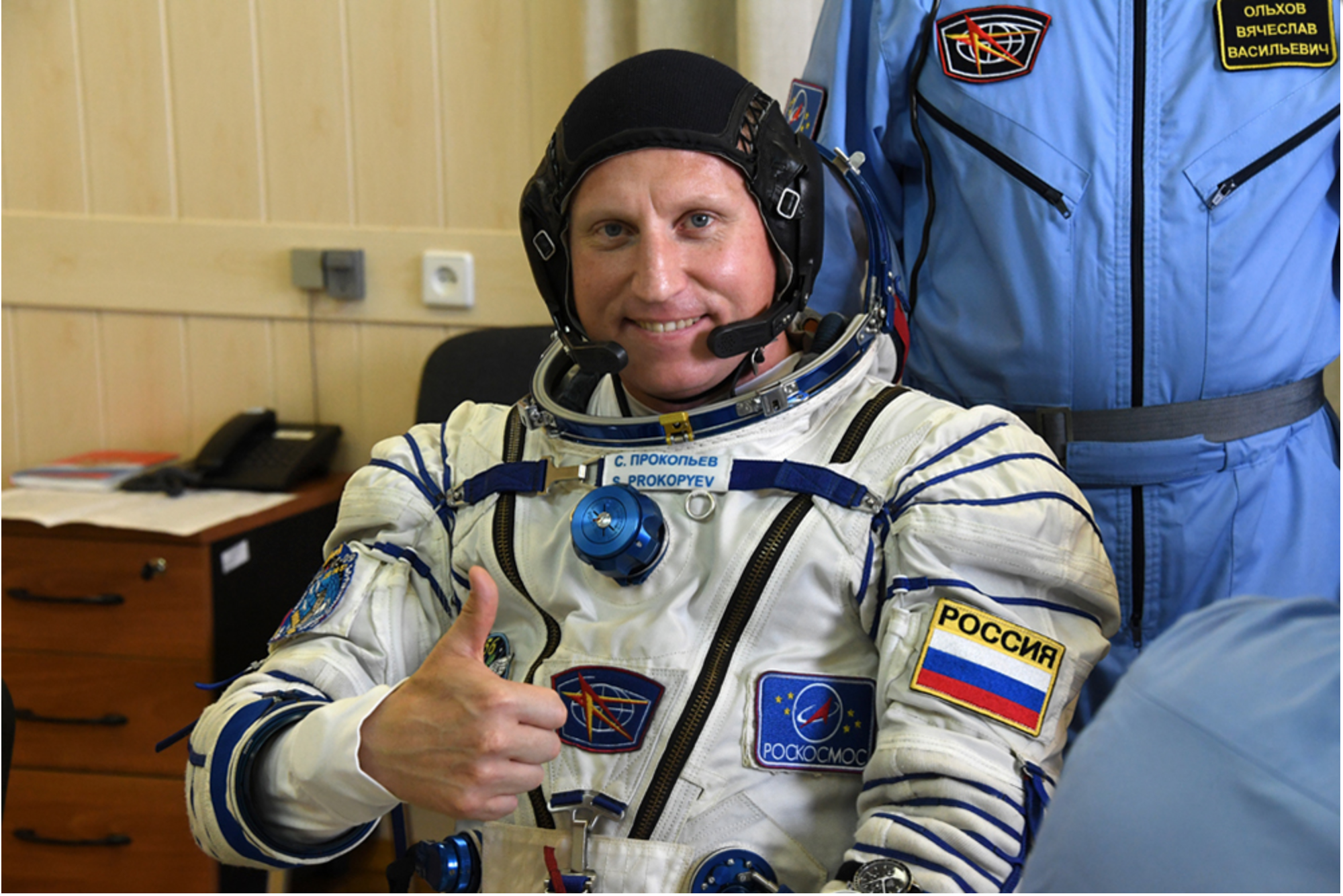 Russian cosmonaut Sergey Prokopiev prior to launch to the ISS in June 2018; space food, coffee or die