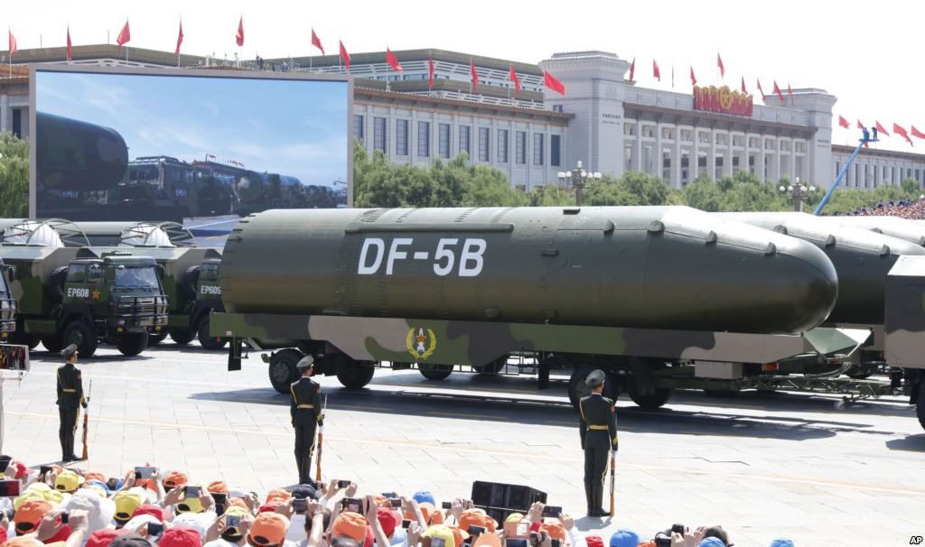 Military vehicles carry DF-5B intercontinental ballistic missiles during a parade commemorating the 70th anniversary of Japan’s surrender during World War II held in front of Tiananmen Gate in Beijing, Sept. 3, 2015. Photo by Voice of America via Wikimedia Commons.