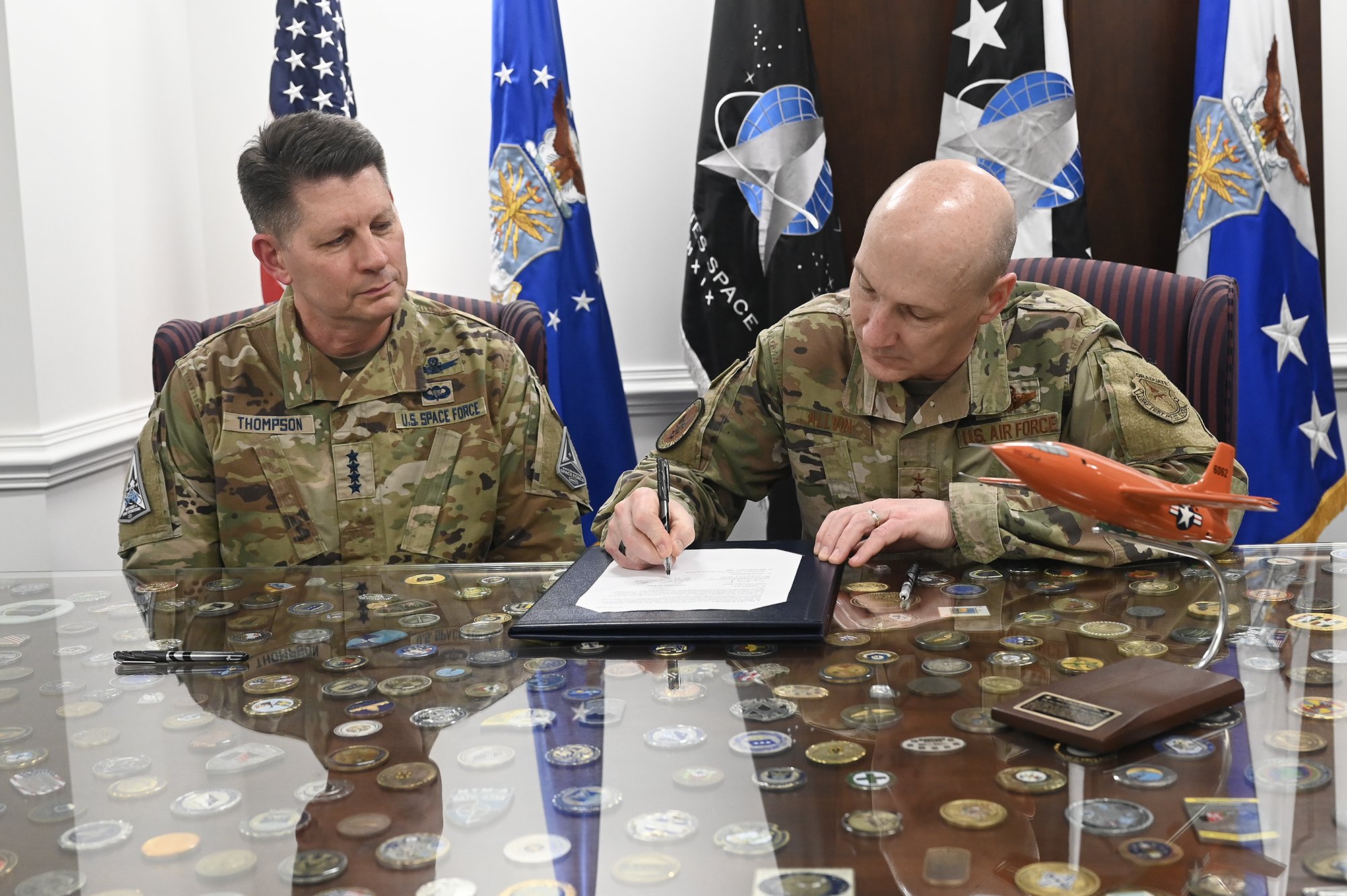 Vice Chief of Staff of the Air Force Gen. Wayne Allvin and Vice Chief of Space Operations Gen. David Thompson sign a memorandum of agreement in the Pentagon