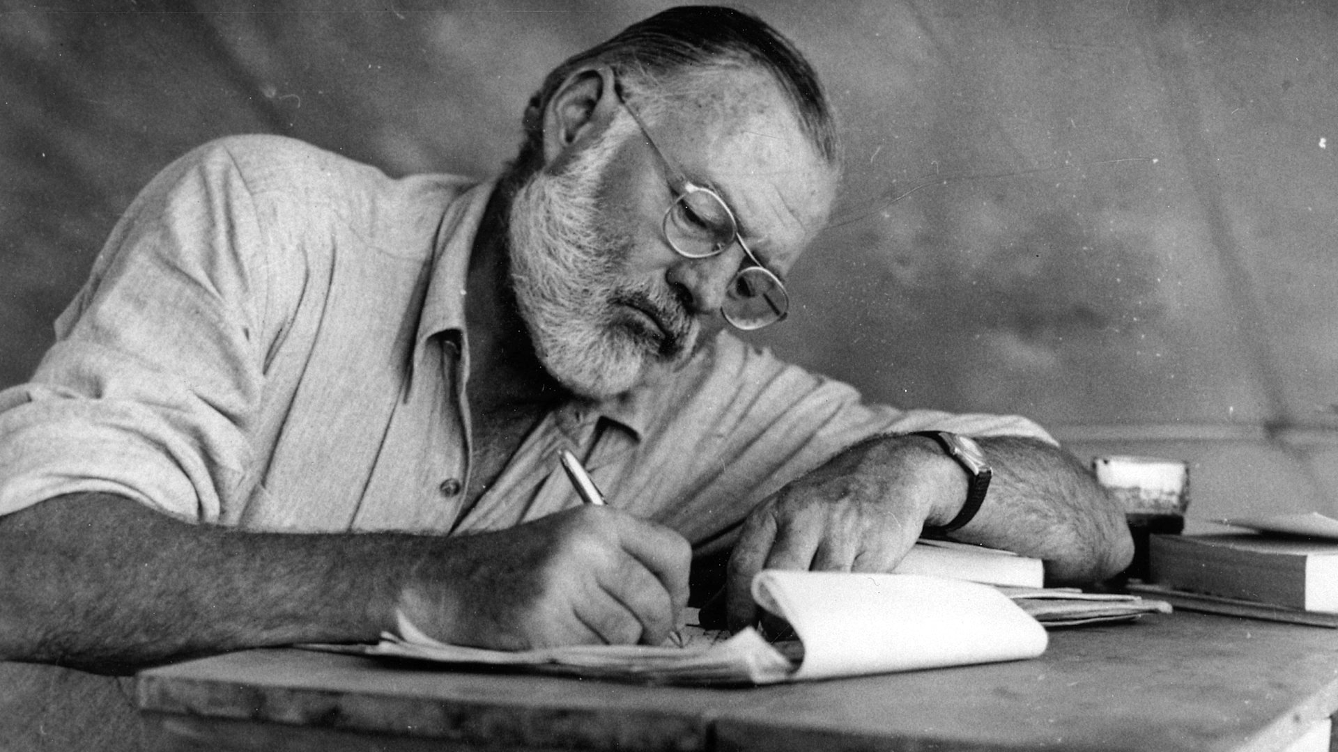 Ernest Hemingway at desk