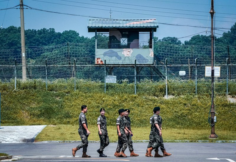 South Korean army soldiers pass by a military guard post at the Imjingak Pavilion in Paju, South Korea, near the border with North Korea.