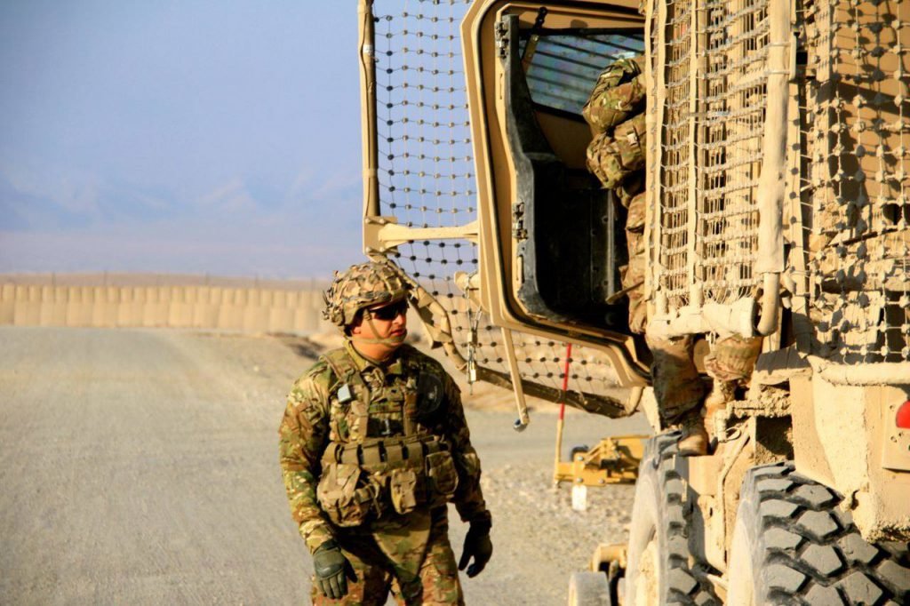 A U.S. Army soldier prepares for a convoy at FOB Shank in Afghanistan in 2013. Photo by Nolan Peterson/Coffee or Die.