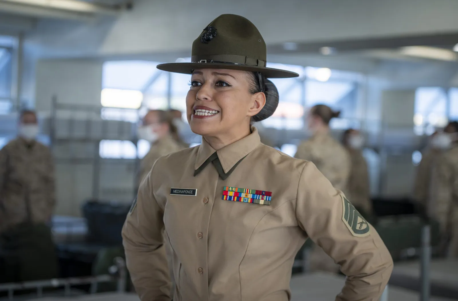 Staff Sgt. Carmen Medinaponce, platoon sergeant for Platoon 3241, instructs the first women ever trained aboard Marine Corps Recruit Depot San Diego on Black Friday, Feb. 12, 2021.