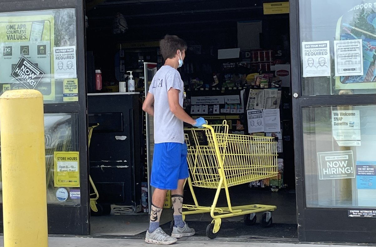 Storm survivors flocked to the Dollar General store along Bayou Black Drive in Houma, Louisiana, Wednesday, Sept. 1, 2021, but it wasn’t open. They were cleaning up storm damage, preparing to open later. Photo by Noelle Wiehe/Coffee or Die Magazine.