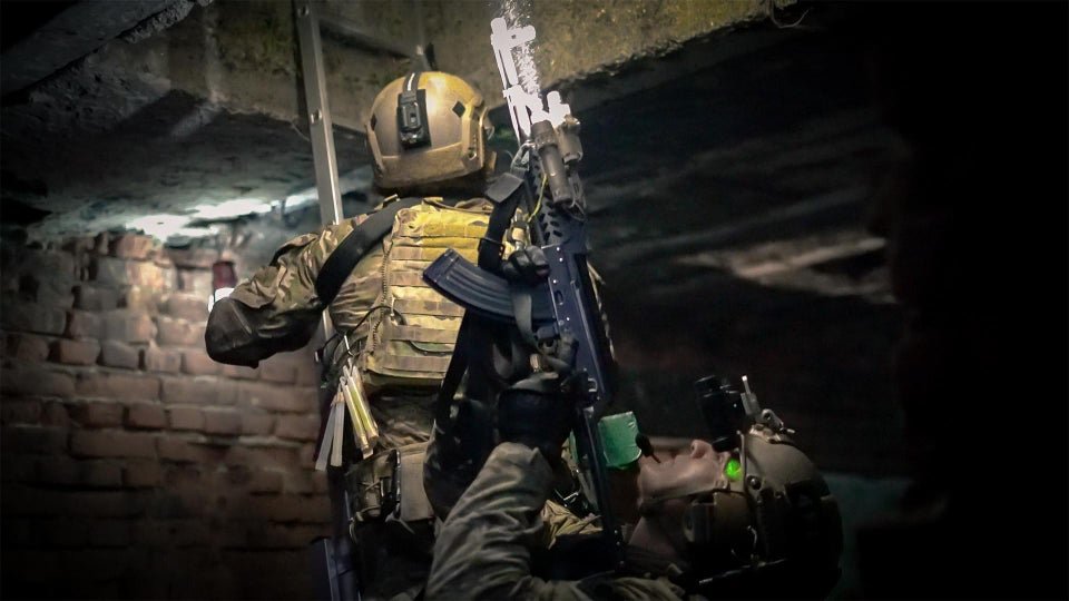 An American Special Forces soldier clears a building during Operation Trojan Footprint. Photo by Marty Skovlund Jr./Coffee or Die.
