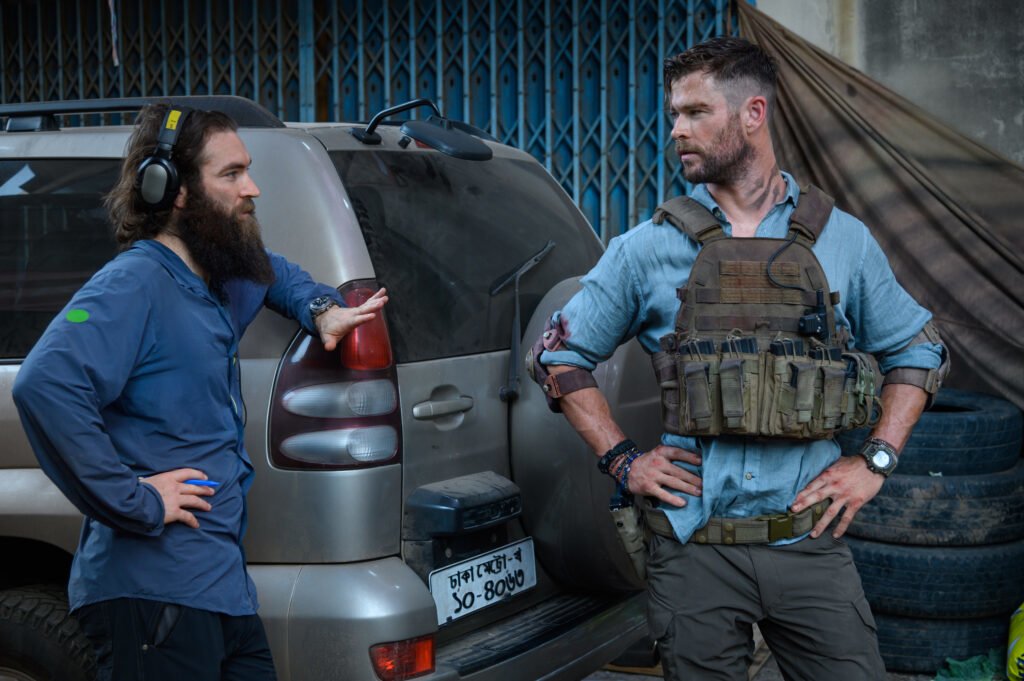 Director Sam Hargrave, left, and Chris Hemsworth on the set of "Extraction." Photo courtesy of Netflix.