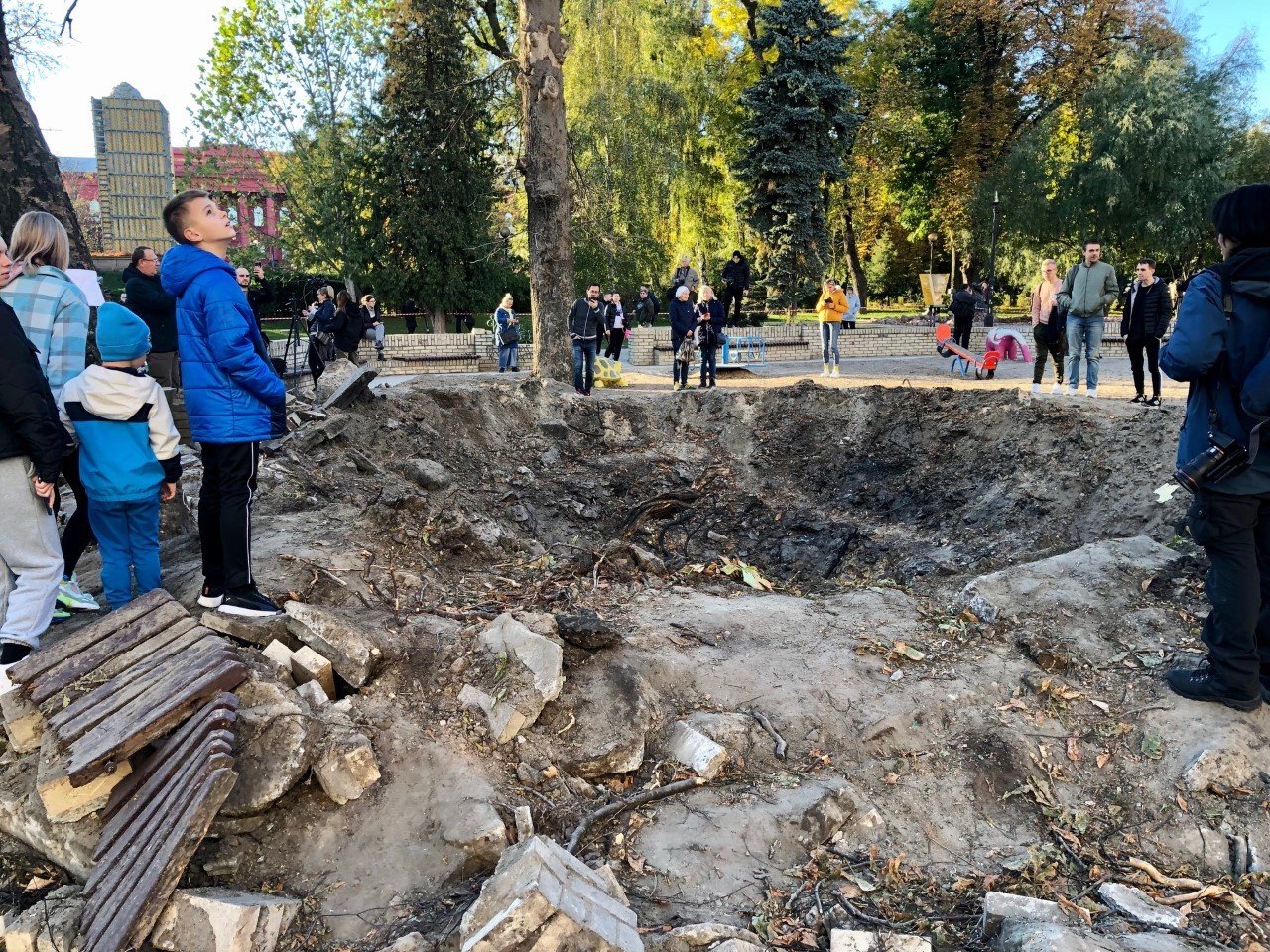 The crater left by a Russian missile, which hit a playground in Kyiv's Shevchenko Park on Oct. 10, 2022. Photo by Nolan Peterson/Coffee or Die.