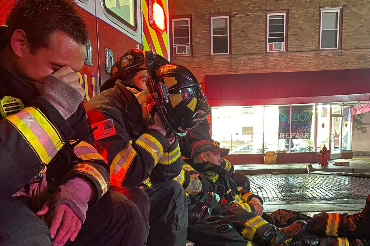 Kenosha firefighters mentally and physically exhausted after a long night of chaos. Photo courtesy of Kristin Kaminski.