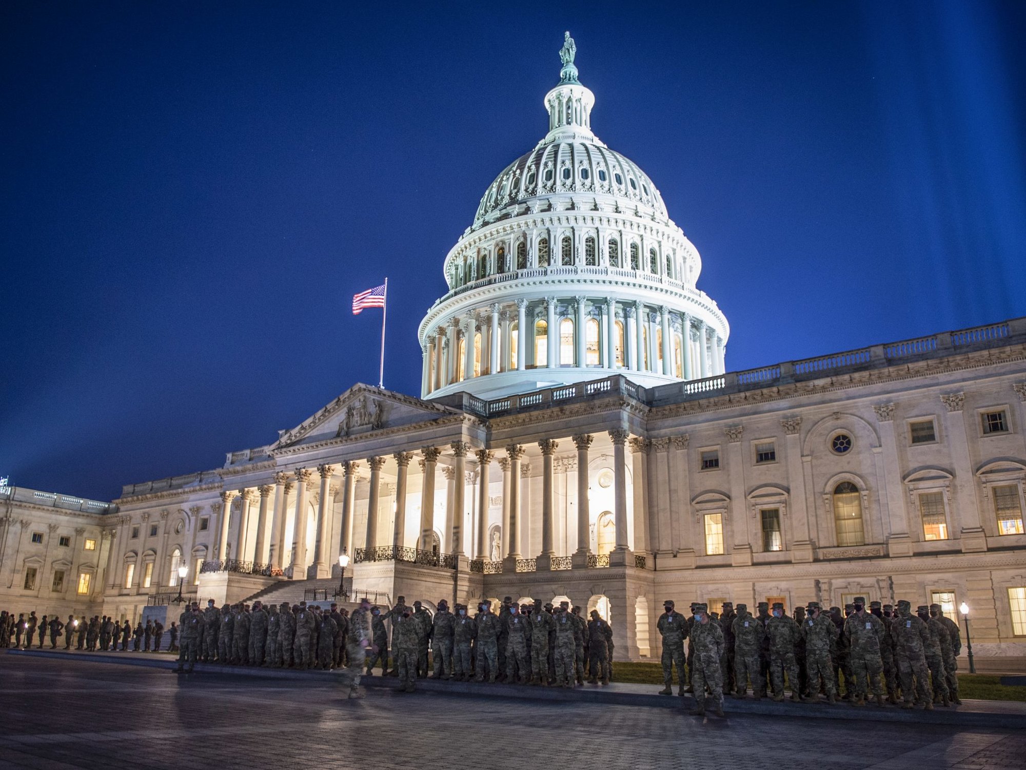 Soldiers with the Oklahoma National Guard stand in formation outside the US Capitol Building Jan. 20, 2021. US Army National Guard photo by Sgt. Anthony Jones.