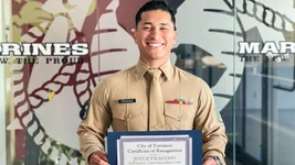 Staff Sgt. Josue Fragoso, in charge of Marine Corps Recruiting South Bay, displays a Certificate of Recognition from Torrance City Mayor George K. Chen, which he received for helping to foil a robbery in California’s Del Amo Fashion Center on Dec. 20, 2022. US Marine Corps photo by Staff Sgt. Immanuel Johnson.