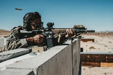 A US Army Special Operation Soldier with 3rd Special Forces Group (Airborne) fires a M4A1 rifle at pop-up targets at Marine Corps Air Ground Combat Center (MCAGCC), Twentynine Palms, California, Oct. 18, 2019. The M4A1 allows service members to stay light, move fast, and engage the enemy accurately. Marine Corps photo by Cpl. William Chockey.