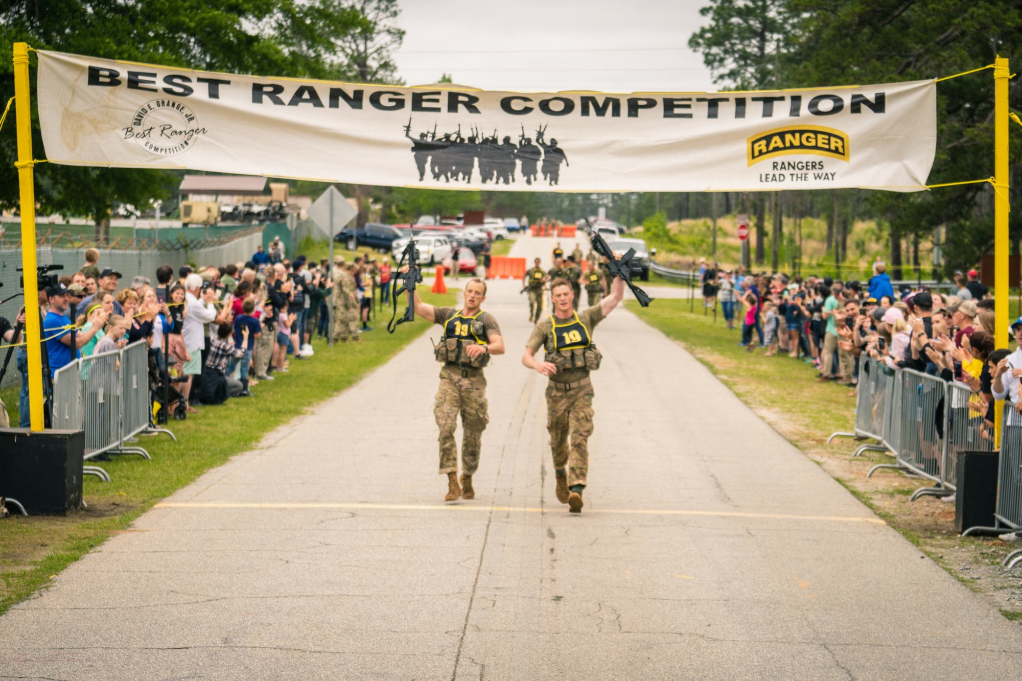 Team 19 of the 101st Airborne Division cross the finish line on Sunday, April 14, during the two-mile buddy run, the final event of the 2019 Best Ranger Competition. Photo by Marty Skovlund Jr./Coffee or Die.