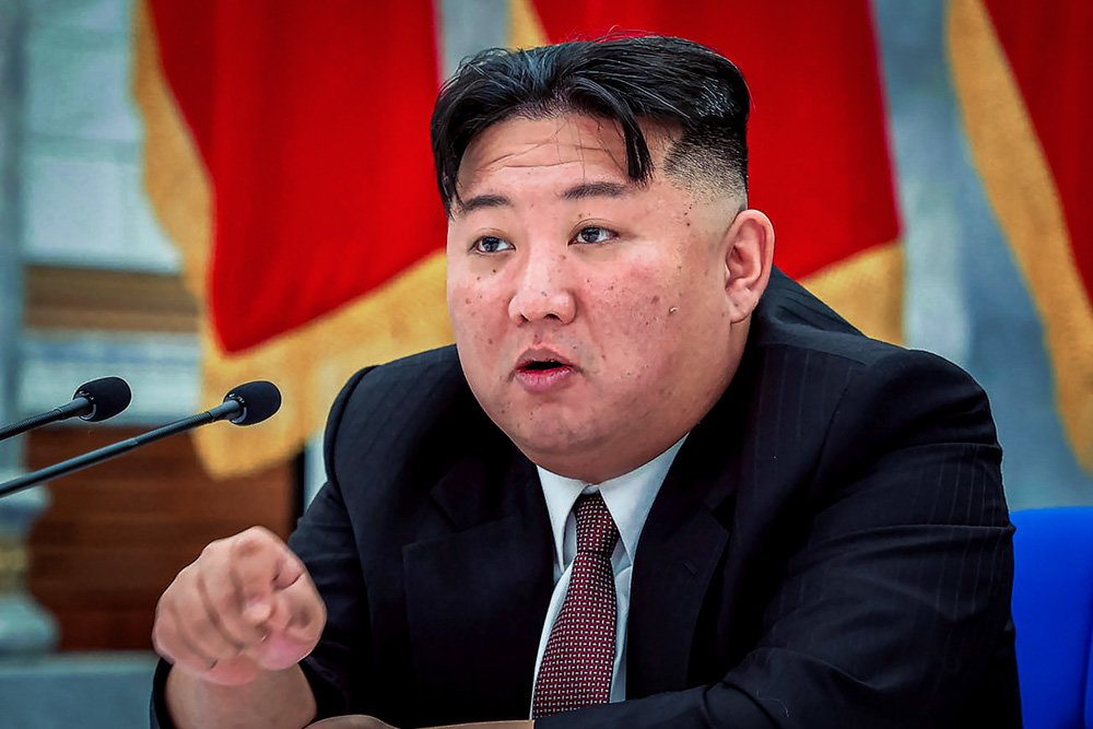 In this photo provided by the North Korean government, North Korean leader Kim Jong Un speaks during a meeting of the Workers' Party of Korea at the party headquarters in Pyongyang