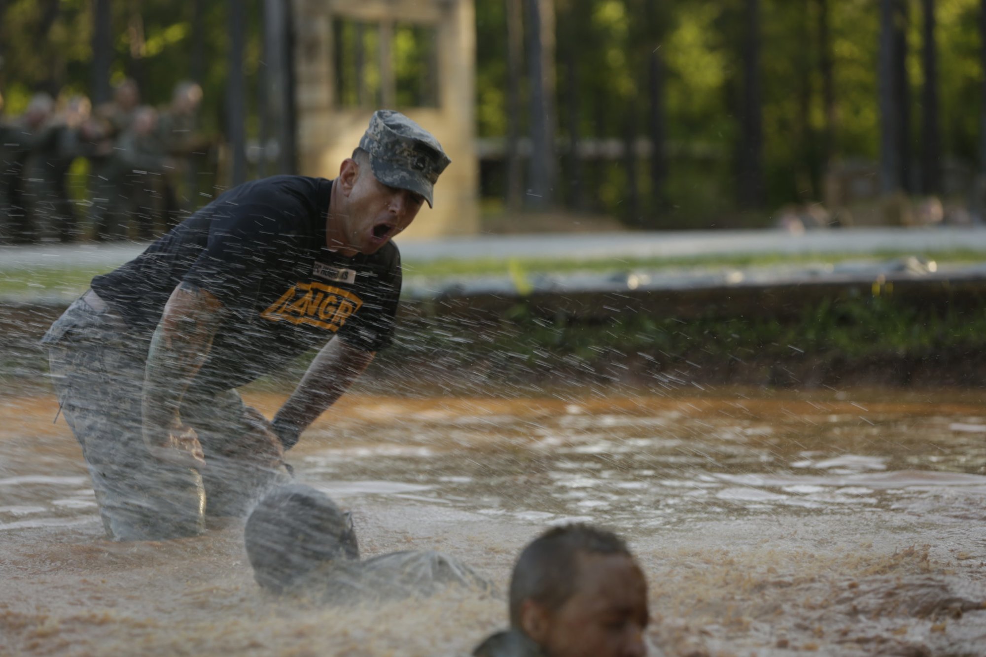 A U.S. Army Ranger School instructor calls out commands to Soldiers during the Ranger Course on Fort Benning, Ga., April 21, 2015. Photo by Sgt. Paul Sale, courtesy of U.S. Army.