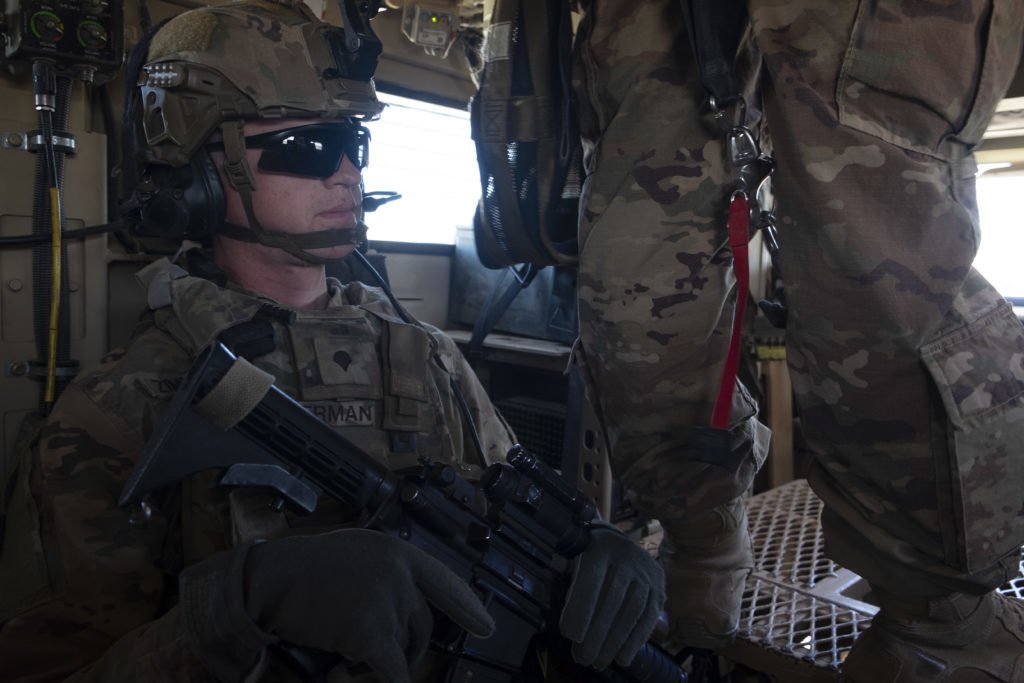 Zimmerman in the back of an MRAP during a perimeter patrol. Photo by Kevin Knodell/Coffee or Die.