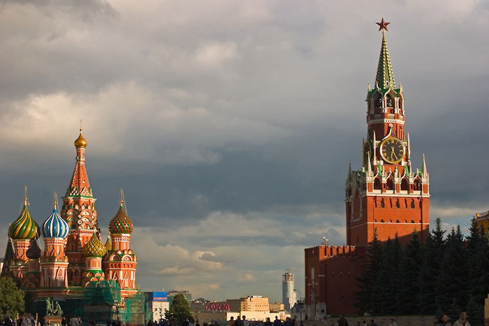 St. Basil’s Cathedral and Spasskaya Tower of Kremlin, Red Square, Moscow. Photo by Dmitry Azovtsev via Wikimedia Commons.