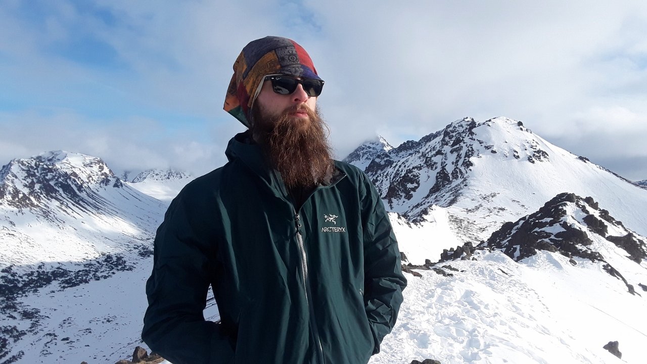 The author on the summit of Peak Two near Anchorage. The Zeta SL is breathable and comfortable to  wear on a mountain ascent. Photo by Chris Kennedy/Coffee or Die.