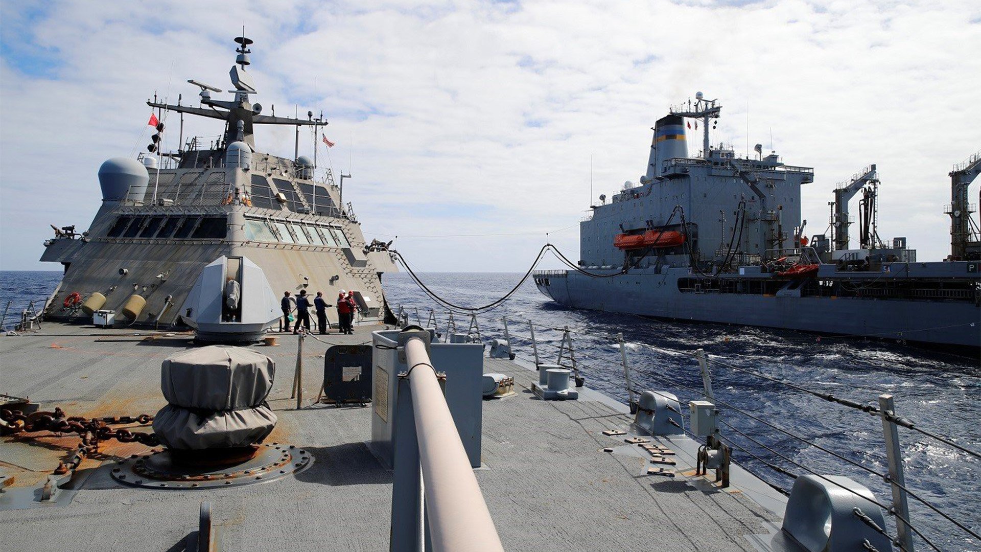 Sailors conduct a replenishment at sea on board the littoral combat ship Sioux City (LCS 11) in the Atlantic Ocean on Sept. 26, 2022. Sioux City was supposed to redeploy to Florida from US Naval Forces Europe's area of operation, but Hurricane Ian had other ideas. US Navy photo by Mass Communication Specialist 3rd Class Nicholas A. Russell.