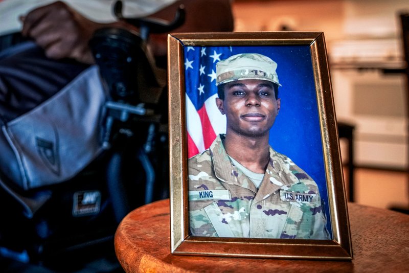 A portrait of American soldier Travis King is displayed