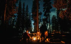 Soldiers gathered around a campfire in Oregon on Sept. 21, 2017. US Army photo by Pvt. Adeline Witherspoon.