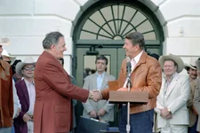 9/24/1983 President Reagan presenting Congressional Gold medal to Louis L’Amour at Barbecue for Professional Rodeo Cowboys Association on South Lawn. Photo courtesy of the White House/Ronal Reagan Presidential Library.