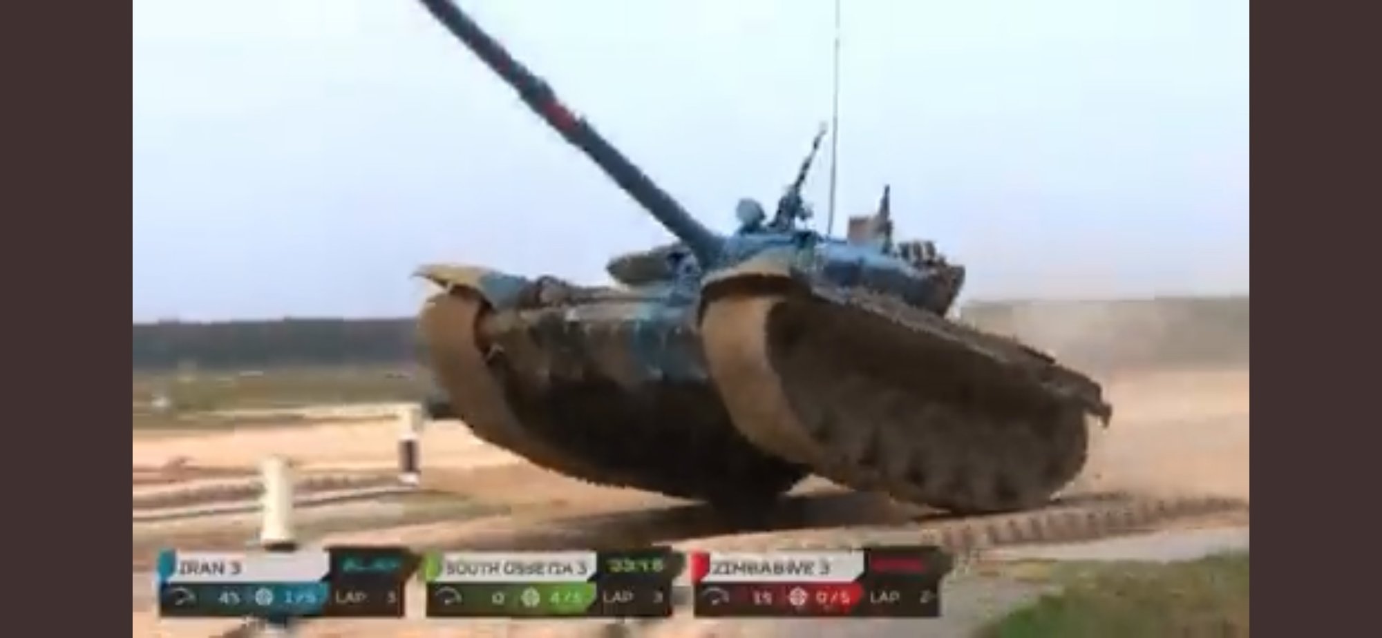 Iranian tank launches over obstacle at the 2022 International Army Games Tank Biathlon.