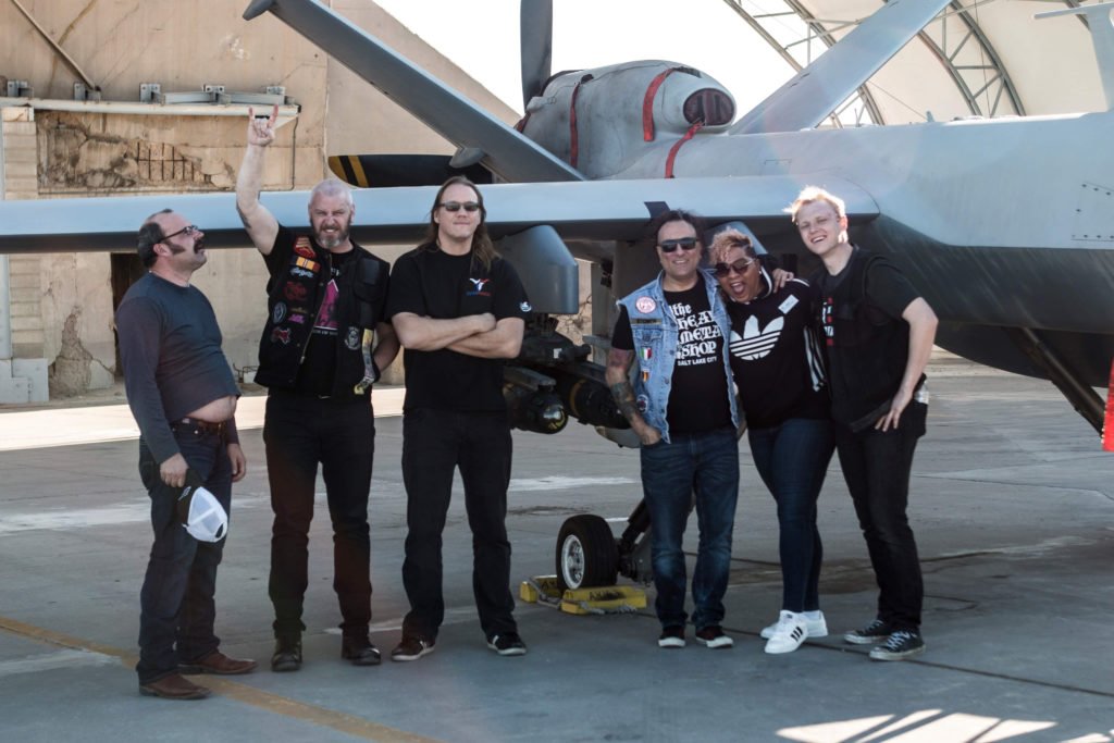 The author and the rock band American Hitmen during an Armed Forces Entertainment Tour. Photo courtesy of Ty Coleman of Rogue Digital.