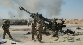 In support of the Iraqi Security Forces (ISF), U.S. Army soldiers assigned to the 2nd Battalion, 8th Field Artillery Regiment, 1st Brigade Combat Team, 25th Infantry Division, fire their M777 towed 155 mm Howitzer at Qayyarah West Airfield, Iraq, September 10, 2019. Photo courtesy of DVIDS/Spc. Kahlil Dash.