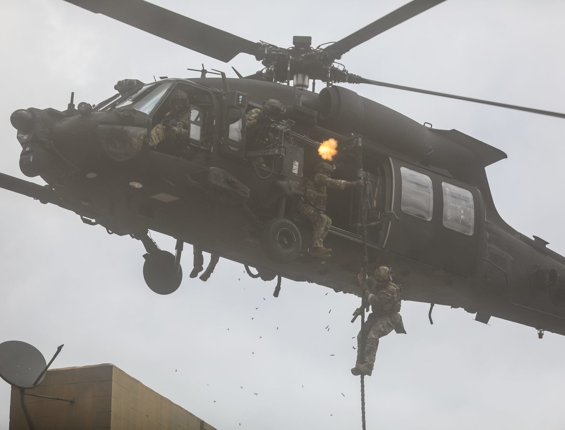 U.S. Army Rangers from 75th Ranger Regiment fast-rope onto buildings in support of the Army Marketing Research Group’s “Warriors Wanted” campaign at Fort Campbell, Ky, on July 22, 2018. Image Used in the Special Operations Recruiting Battalion Campaign.