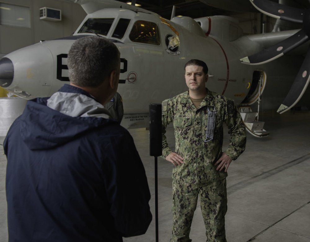 U.S. Navy Aviation Machinist's Mate 1st Class Michael Helms, from Middletown, New York, answers interview questions for a live social media broadcast for Virtual Fleet Week New York, May 20. Photo by Mass Communication Specialist 3rd Class Andrew Taylor/U.S. Navy, Released.