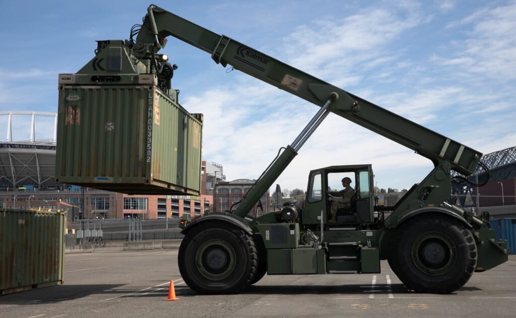 U.S. Army soldiers from 62nd Medical Brigade and 47th Combat Support Hospital from Joint Base Lewis-McChord, Washington, and from 627th Hospital Center and 10th Field Hospital from Fort Carson, Colorado, are preparing to relocate to better assist new communities requiring medical support in Seattle, April 10, 2020. Photo by Private First Class Genesis Miranda, courtesy of the U.S. Army.