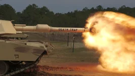 An M1A2 Abrams main battle tank fires during the 2022 African Land Forces Summit at Fort Benning, Georgia. US Army photo by Staff Sgt. Brandon Rickert. 
