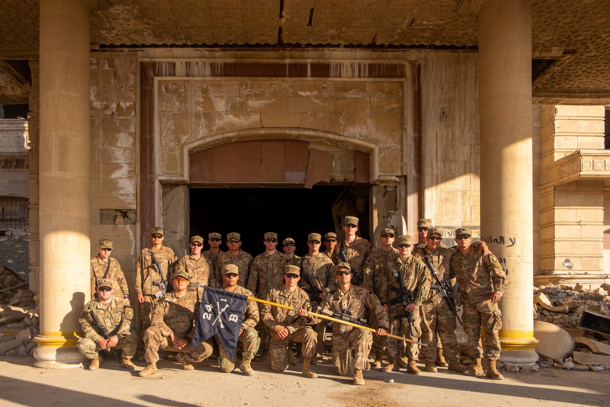 1-24 Barbarian Company before the entrance of Saddam’s palace. Photo by Kimberly Westenhiser/Coffee or Die.