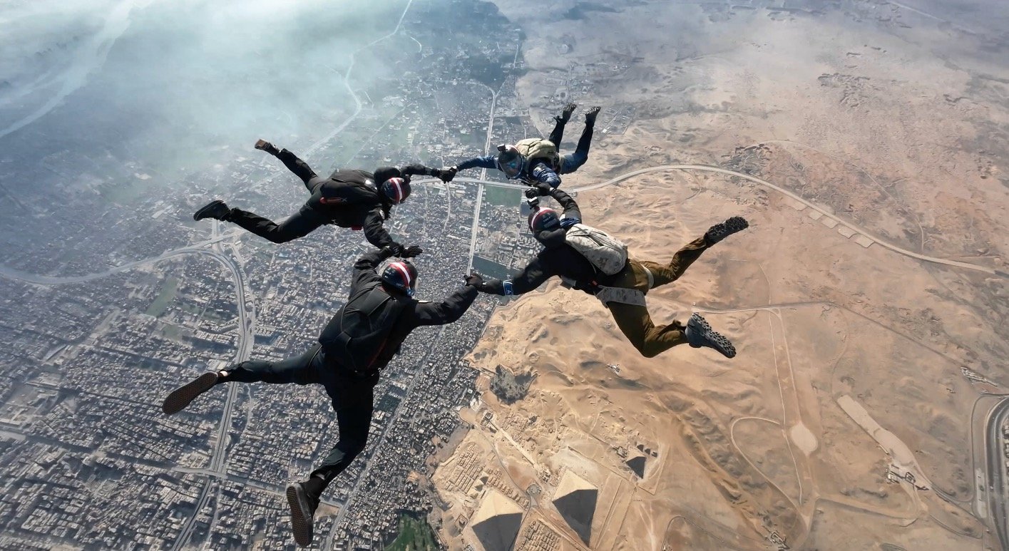 Four Triple 7 jumpers in freefall over the Giza pyramid complex in Egypt, Jan. 13, 2023. Photo courtesy of Glenn Cowan.