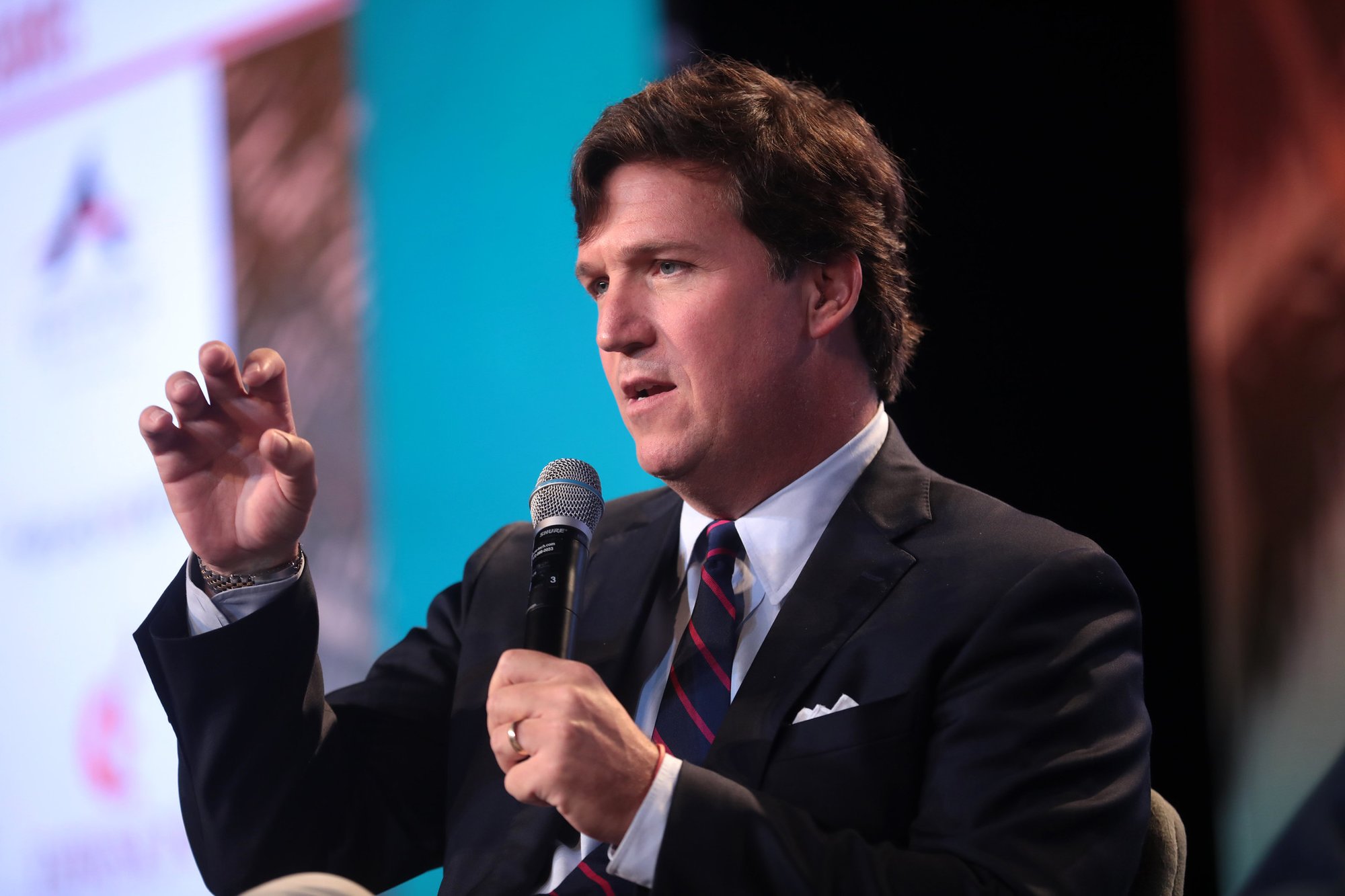 Tucker Carlson, Donahoe tweet