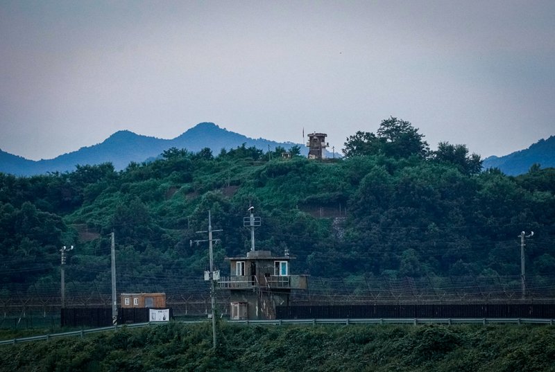 A North Korean military guard post, rear, and South Korea post, bottom, are seen in Paju near the border with North Korea, South Korea.