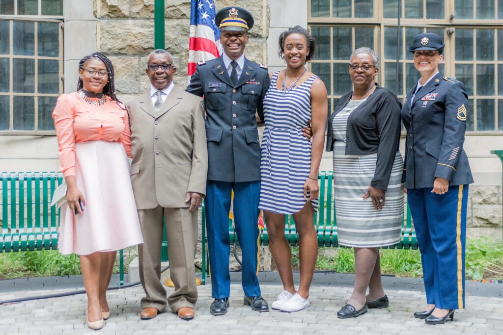 Alix Idrache and family at Idrache's graduation from the United States Military Academy, also known as West Point, on May 21, 2016. Photo by Sgt. Ryan Noyes, 29th Mobile Public Affairs Detachment, courtesy of DVIDS.