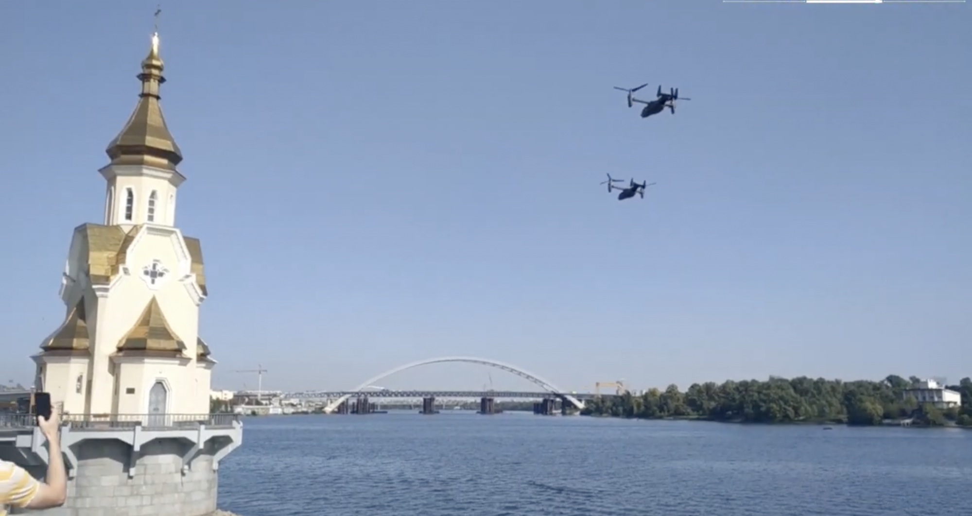 A pair of US Air Force CV-22B Ospreys flies over Kyiv’s Dniper Reiver on Wednesday. Photo by Defense Express via YouTube screenshot.
