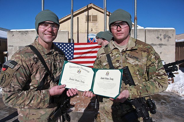 These troops hold their honorable discharges — the complete opposite of a dishonorable discharge. Photo courtesy of the DOD.